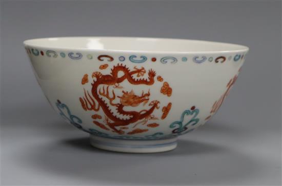 A Chinese doucai dragon bowl, D. 13cm